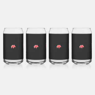 a red flower on a black background can glass