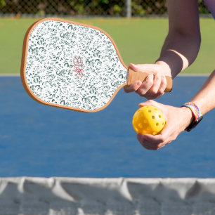a red flower on a black background pickleball paddle