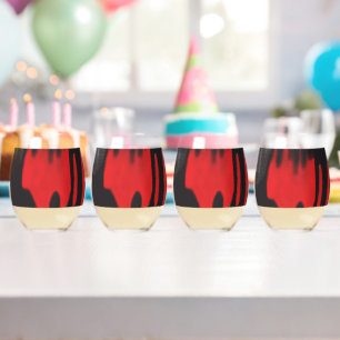 A red graphic design featuring bold geometric shap stemless wine glass