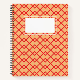 A red grid notebook