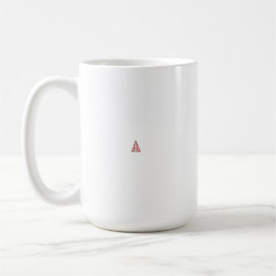 A red ornament with a floral and conifer motif is coffee mug
