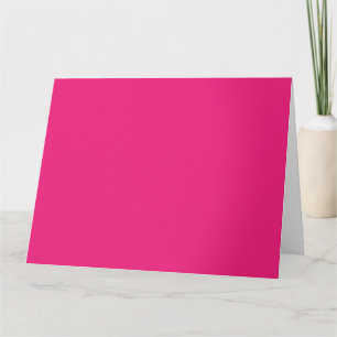 A red rose with vibrant petals surrounded by delic card