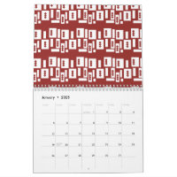 A red rug with a textured pattern is spread out on
