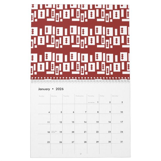 A red rug with a textured pattern is spread out on calendar (Jan 2026)