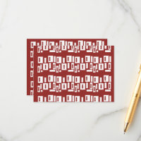 A red rug with a textured pattern is spread out on