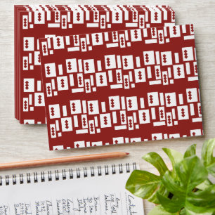 A red rug with a textured pattern is spread out on envelope