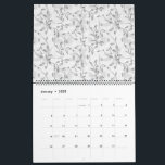 A refined black and white floral motif, highlighti calendar<br><div class="desc">This sophisticated product features a tastefully curated black and white floral motif, showcasing a variety of intricate flowers and foliage. The diverse design captures the essence of elegance and beauty, making it a timeless addition to any space.</div>