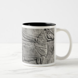 A relief depicting the Assyrian army in battle Two-Tone Coffee Mug