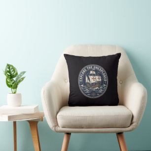 A retro Columbus Day emblem with a caravel ship Cushion