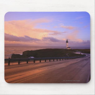 A Road & A Lighthouse Along The Coast At Sunset Mouse Pad