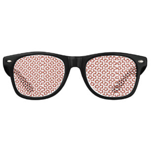 A rolled-up piece of wrapping paper with a festive retro sunglasses