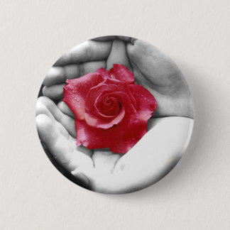 A Rose in the Hand 2 6 Cm Round Badge
