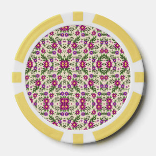 A round decorative plate with a detailed floral poker chips