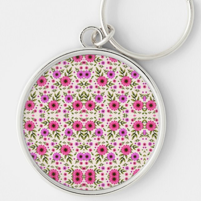 A round keychain featuring a colorful floral  (Front)