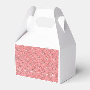 A rug with a red and pink motif features a decorat favour box