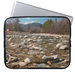 A running stream river with clear water flowing wi laptop sleeve