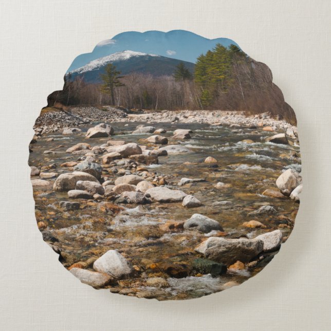 A running stream river with clear water flowing wi round cushion (Front)