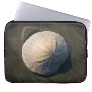 A Sand Dollar On The Beach Laptop Sleeve