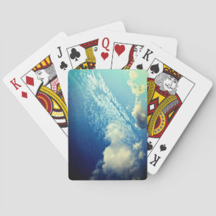 A scatter of clouds playing cards