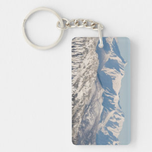 A Scenic View of Snowy Mountains and Trees. Key Ring