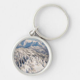 A Scenic View of Snowy Mountains and Trees. Key Ring