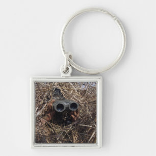 A scout observer practices observation techniqu key ring