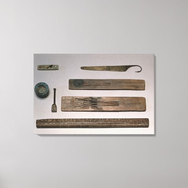 A scribe's instruments (wood, ivory, bronze and en canvas print (Front)