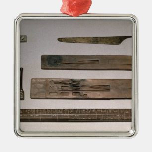 A scribe's instruments (wood, ivory, bronze and en metal tree decoration