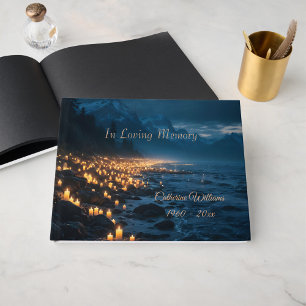 A sea of candlelights on the beach, condolence  guest book