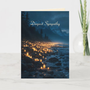 A sea of candlelights on the beach in the dark card