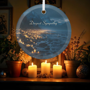 A sea of candlelights on the beach, sympathy  glass tree decoration
