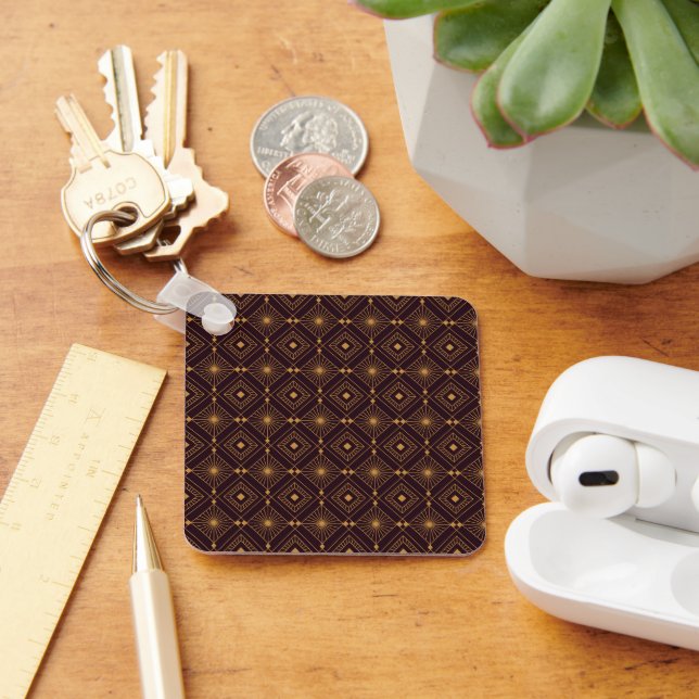 A seamless geometric pattern featuring gold art  key ring (Desk)