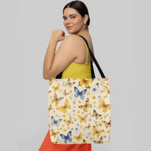 A seamless pattern of various butterflies flowers  tote bag