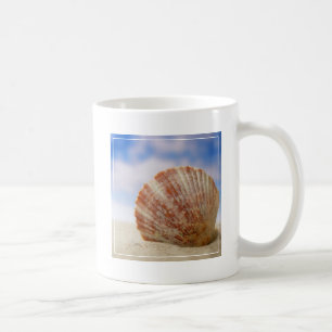 A Shell Propped In The Sand Coffee Mug