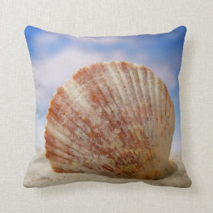 A Shell Propped In The Sand Cushion