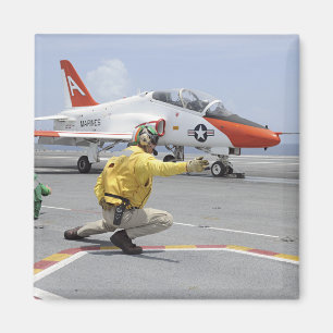 A shooter aboard the aircraft carrier magnet