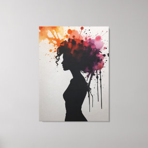 a silhouette of a woman with colourful paint splat canvas print