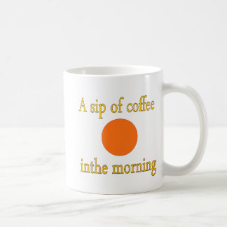 A sip of coffee in the morning from a cup