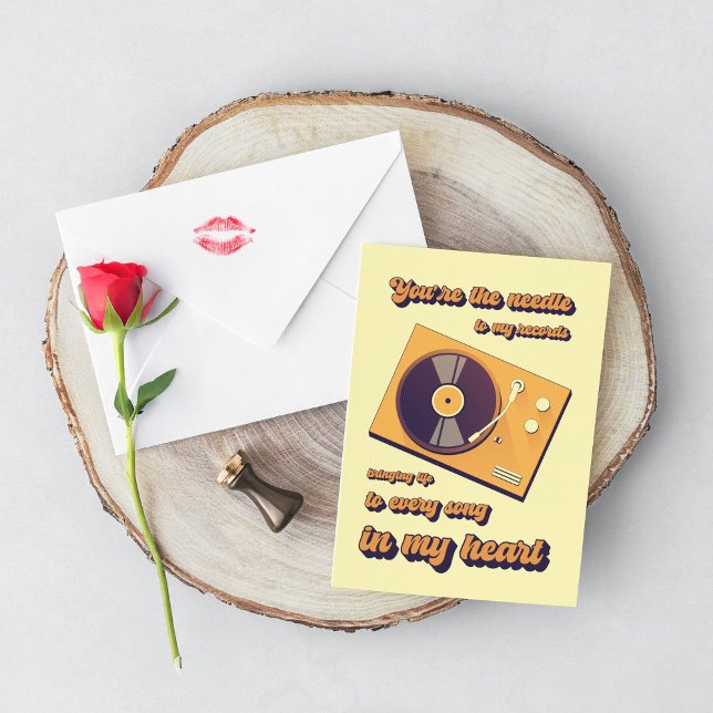 A sleek turntable spinning a vinyl record. card (Creator Uploaded)