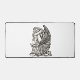 A sleeping Angel on the Stone Desk Mat