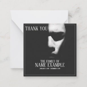 A sleeping face in half shadow card