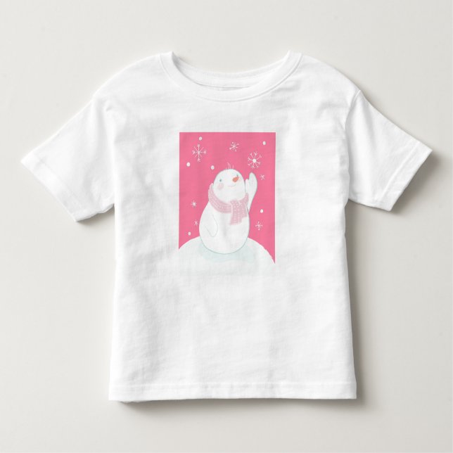 A snowman reaching for a falling snowflake toddler T-Shirt (Front)