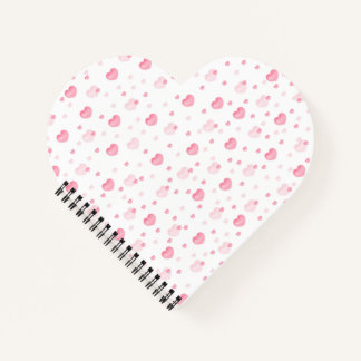 A soft and romantic pattern featuring pastel pink notebook