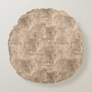 A soft tan colour repeat pattern of many leopards  round cushion