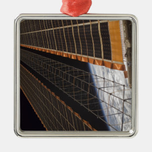 A solar array wing metal tree decoration
