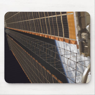 A solar array wing mouse pad