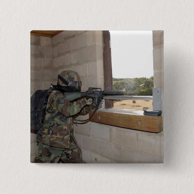 A soldier acts as an opposition force 15 cm square badge (Front)