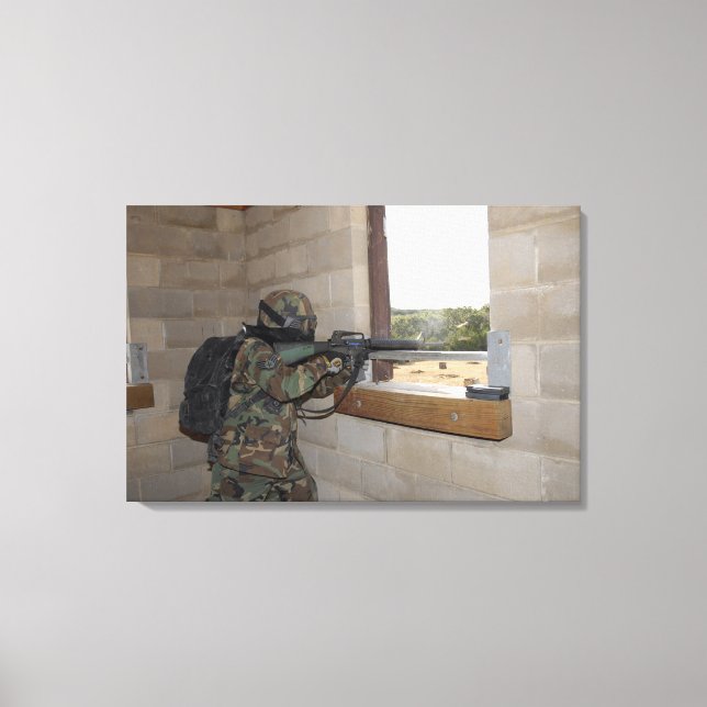 A soldier acts as an opposition force canvas print (Front)