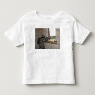 A soldier acts as an opposition force toddler T-Shirt