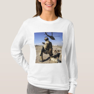 A soldier conducts security for an HH-60 T-Shirt